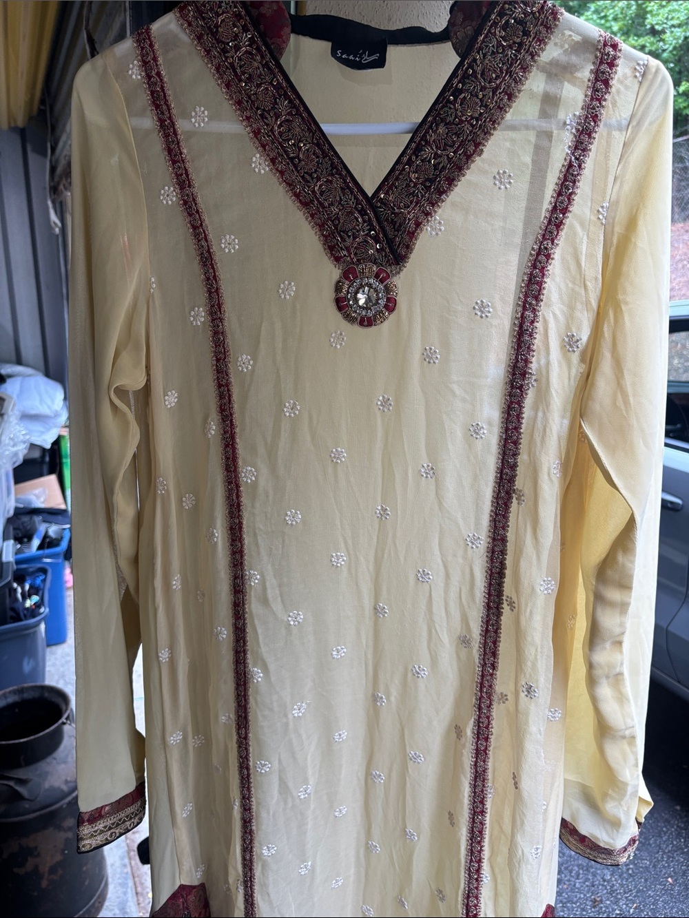 Sania BlackTrim V-Neck Top with Gold Embroidery.